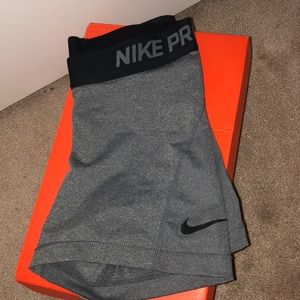 Nike grey and black spandex.